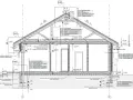 Przekrój przez budynek, szczegółowy projekt architektoniczno budowlany z opisem warstw izolacji i konstrukcji.